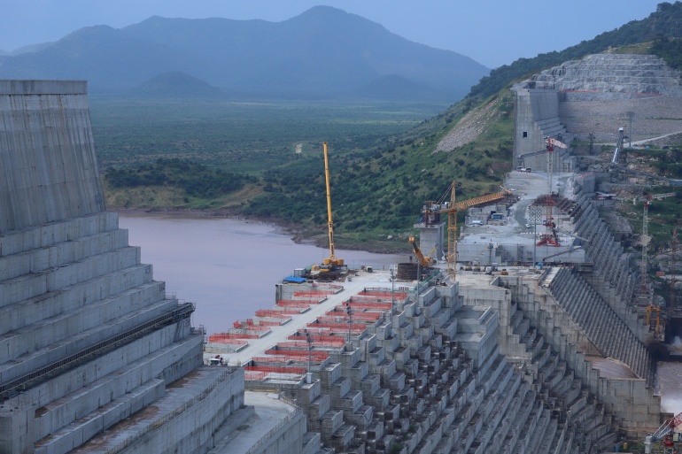 سد النهضة 2021 FILE PHOTO: Ethiopia's Grand Renaissance Dam is seen as it undergoes construction work on the river Nile in Guba Woreda, Benishangul Gumuz Region, Ethiopia, September 26, 2019. REUTERS/Tiksa Negeri/File Photo المصدر: رويترز ID: tag:reuters.com,2021:newsml_RC23NN92M7ZJ:1258915581
